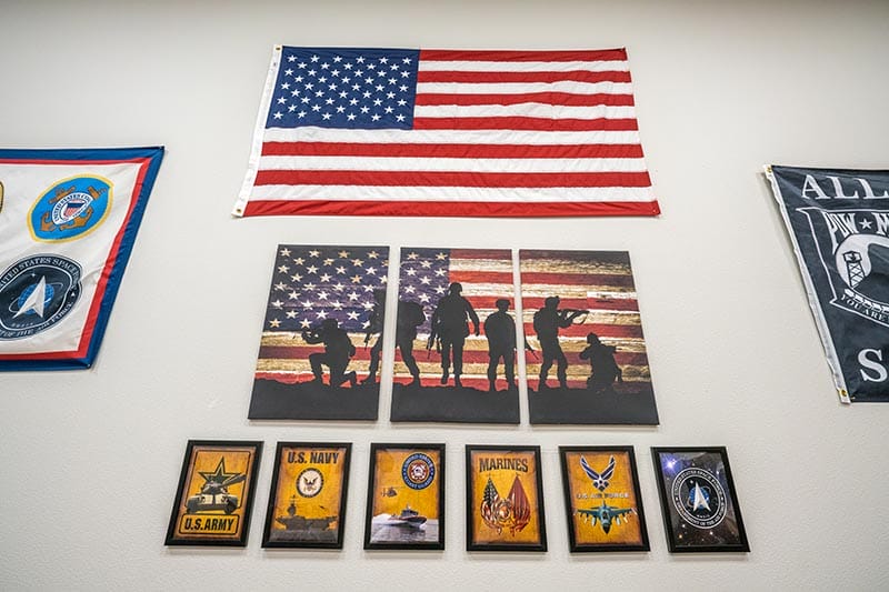 Flags and pictures that represent veterans